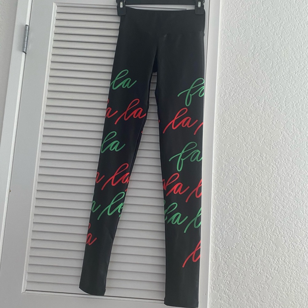 Never worn! GOLDSHEEP. XS. FA LA LA PRINT LEGGINGS.